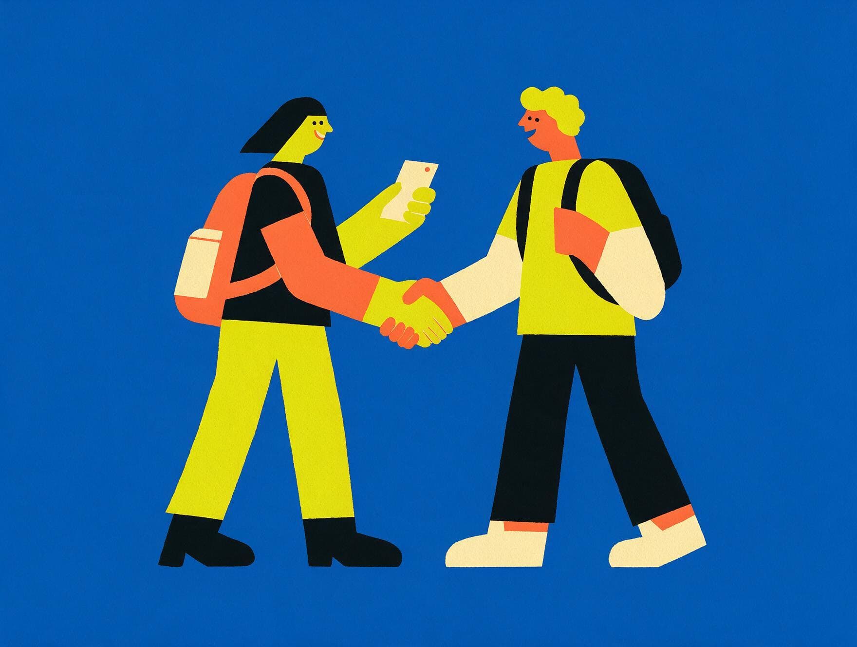 Two students shaking hands after meeting